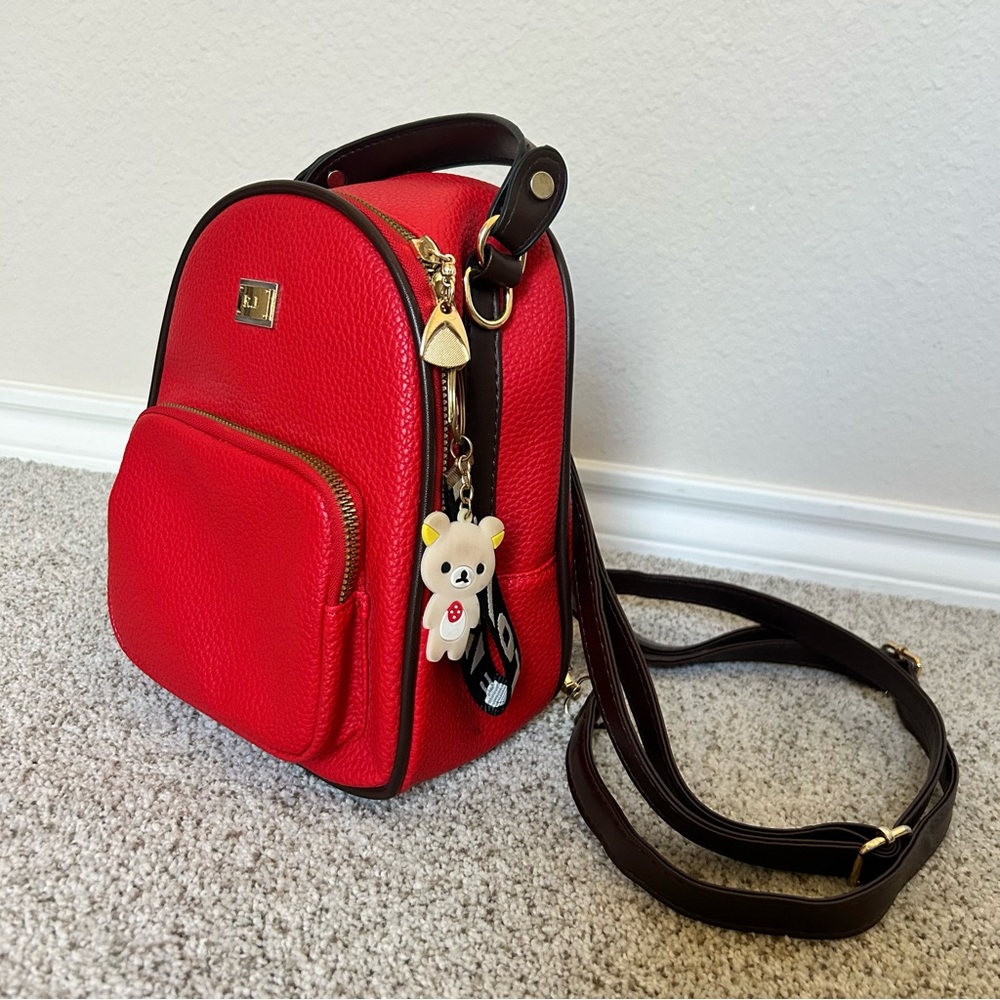 Red Leather Mini Backpack with key charms and multi-use straps